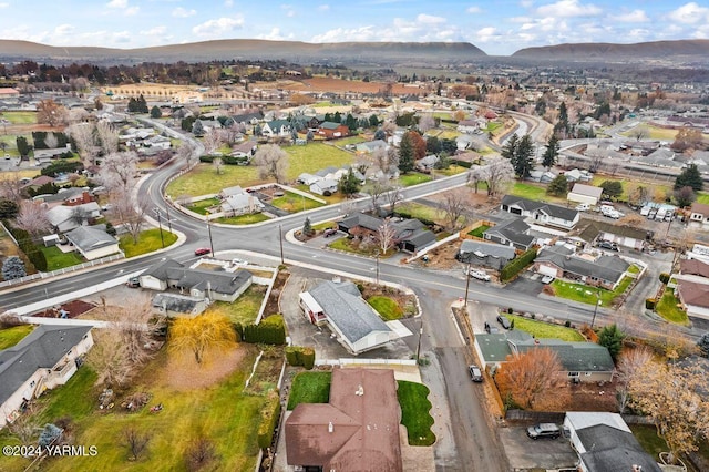 bird's eye view featuring a mountain view and a residential view