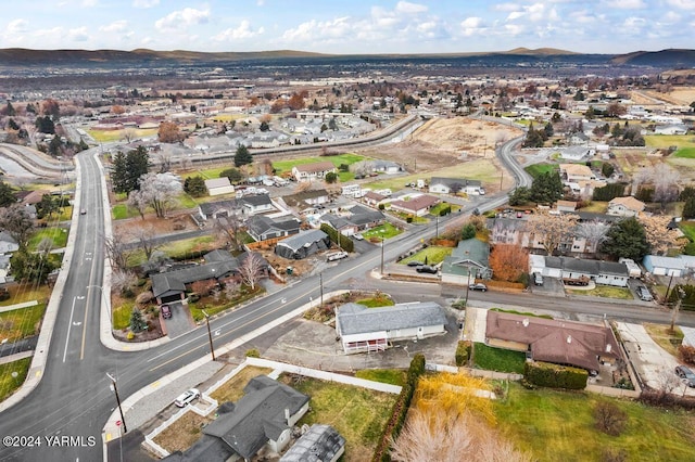 aerial view featuring a mountain view and a residential view