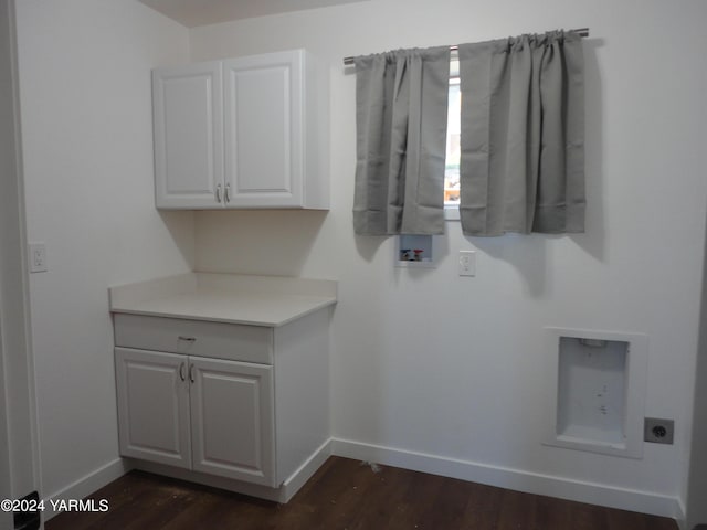 laundry area with cabinet space, baseboards, dark wood-style flooring, hookup for a washing machine, and electric dryer hookup