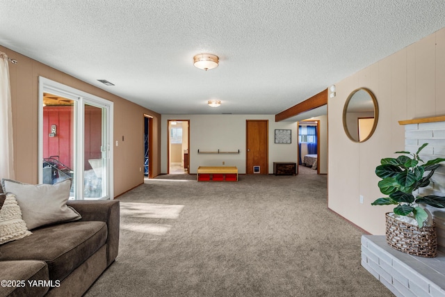 607 N 53rd Ave, Yakima, WA 98908 - carpeted living room featuring a textured ceiling