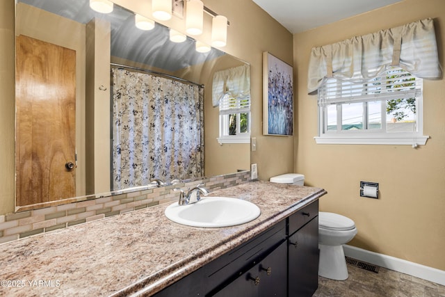 607 N 53rd Ave, Yakima, WA 98908 - full bathroom with vanity, tasteful backsplash, and a shower with shower curtain