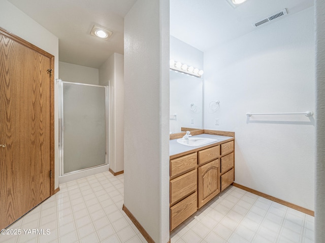 9203 W Yakima Ct, Yakima, WA 98908 - bathroom featuring vanity, a shower stall, tile patterned floors, and baseboards
