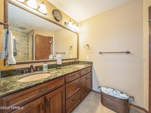 9203 W Yakima Ct, Yakima, WA 98908 - bathroom featuring double vanity, a shower stall, and baseboards
