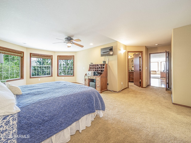 9203 W Yakima Ct, Yakima, WA 98908 - bedroom with light carpet, ensuite bathroom, baseboards, ceiling fan, and recessed lighting