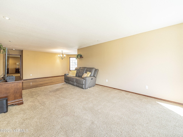 9203 W Yakima Ct, Yakima, WA 98908 - unfurnished living room with a chandelier, carpet floors, and baseboards