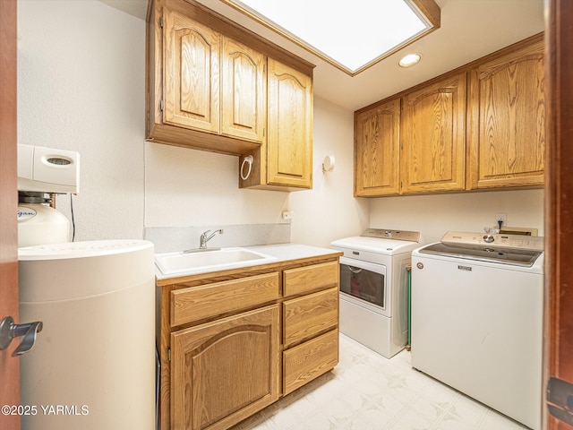 9203 W Yakima Ct, Yakima, WA 98908 - washroom featuring washer and dryer, cabinet space, and light floors