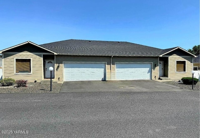 3103 Swan Ave, Yakima, WA 98902 - single story home with an attached garage and asphalt driveway