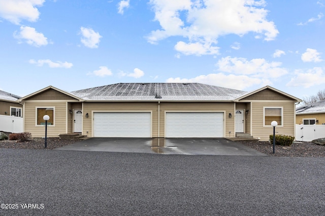 3103 Swan Ave, Yakima, WA 98902 - ranch-style home with asphalt driveway and an attached garage