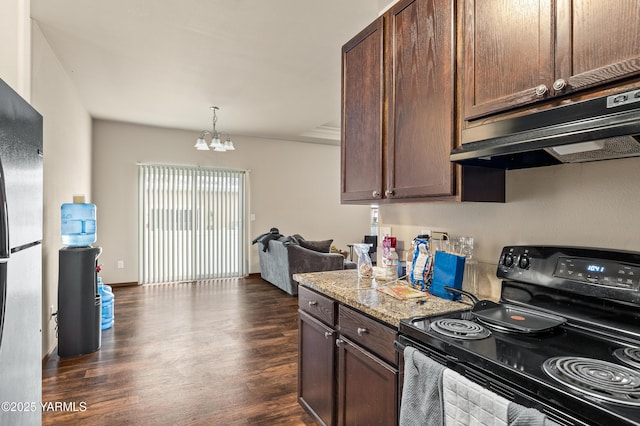 3103 Swan Ave, Yakima, WA 98902 - kitchen featuring black electric range, exhaust hood, freestanding refrigerator, dark wood-type flooring, and a chandelier