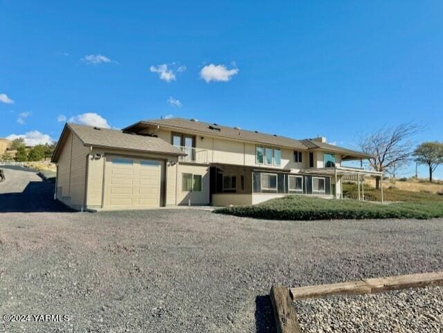 view of front facade with driveway and an attached garage