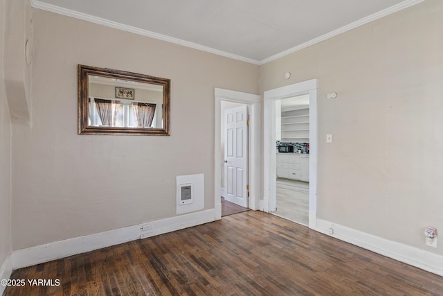 204 S 8th St, Yakima, WA 98901 - spare room featuring wood finished floors and ornamental molding