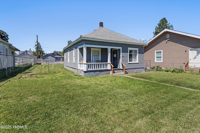 204 S 8th St, Yakima, WA 98901 - view of front of property with covered porch and a chimney