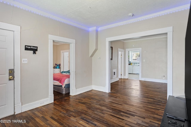 204 S 8th St, Yakima, WA 98901 - empty room with ornamental molding, wood-type flooring, and a textured ceiling