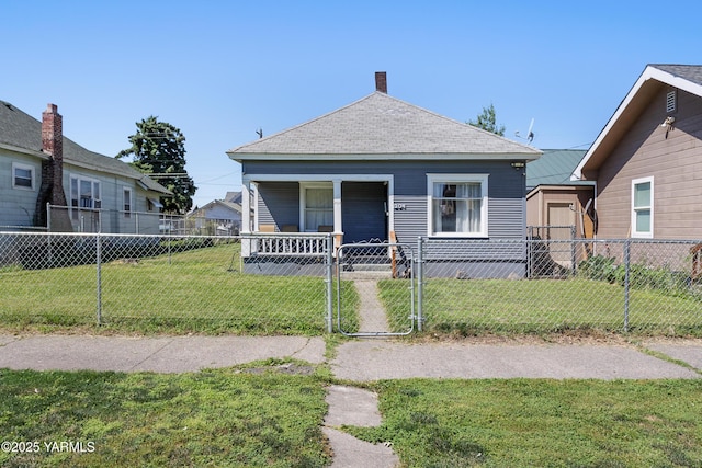 204 S 8th St, Yakima, WA 98901 - view of front facade with a gate, a fenced front yard, a porch, roof with shingles, and a chimney