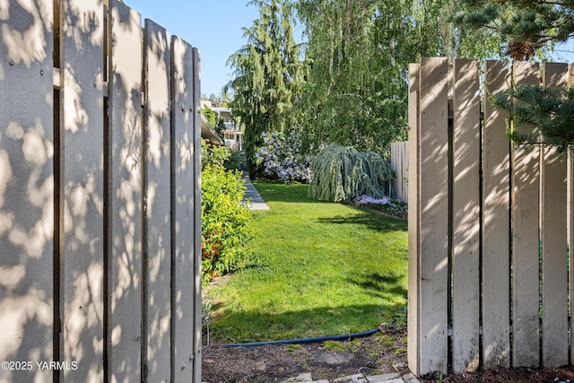view of yard featuring fence