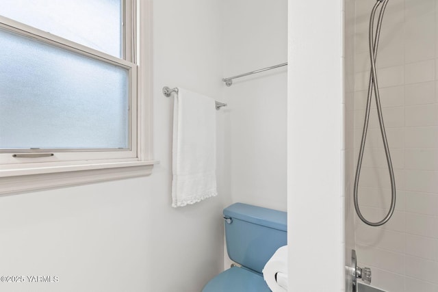 full bath with toilet and shower / bath combination