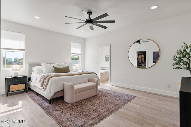 703 S 87th Ave, Yakima, WA 98908 - bedroom featuring light wood-style floors, baseboards, recessed lighting, ensuite bathroom, and ceiling fan