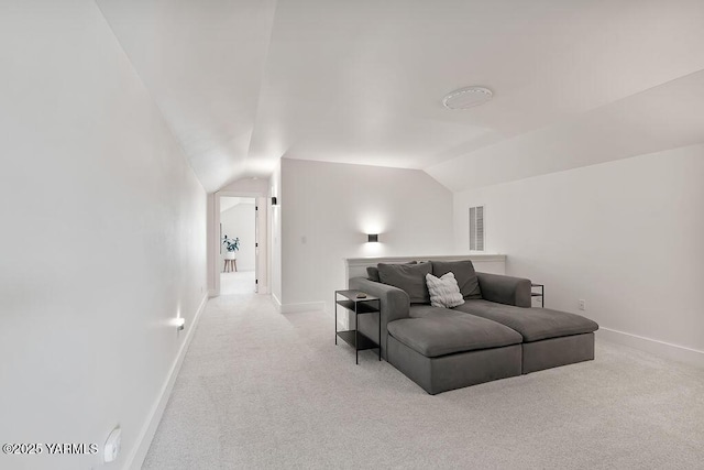 703 S 87th Ave, Yakima, WA 98908 - living room featuring carpet, vaulted ceiling, and baseboards
