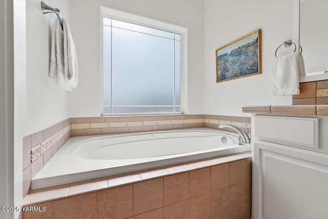 703 S 87th Ave, Yakima, WA 98908 - bathroom featuring a garden tub, vanity, and healthy amount of natural light