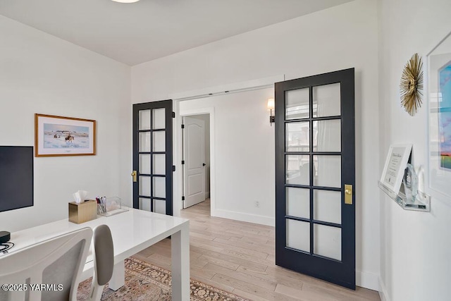 703 S 87th Ave, Yakima, WA 98908 - office with light wood-type flooring, french doors, and baseboards