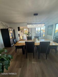 610 Blossom Ln, Zillah, WA 98953 - dining space featuring wood finished floors and plenty of natural light