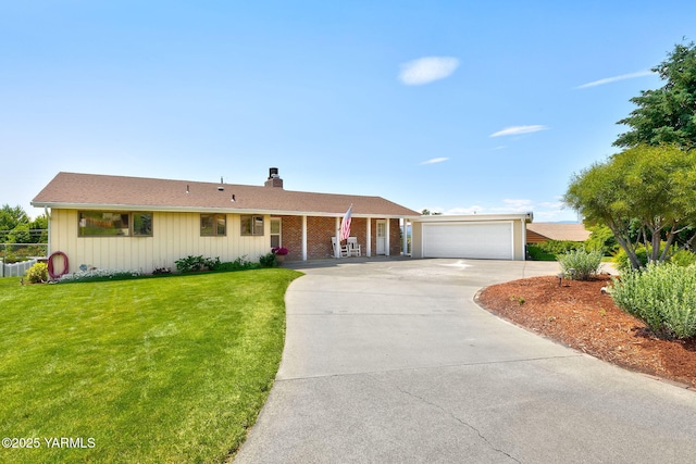 5306 Douglas Dr, Yakima, WA 98908 - ranch-style house featuring a chimney, a front lawn, a garage, board and batten siding, and driveway