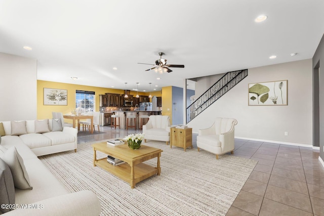 living room with recessed lighting, stairway, and light tile patterned floors