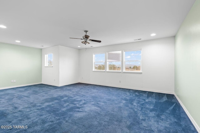 carpeted spare room with baseboards, ceiling fan, visible vents, and recessed lighting