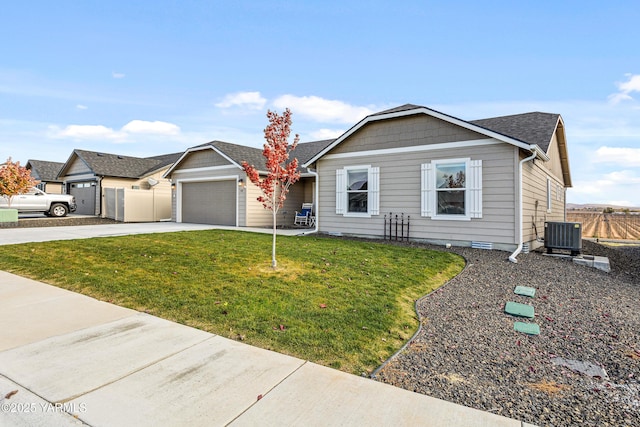 ranch-style house with driveway, a garage, fence, central air condition unit, and a front lawn