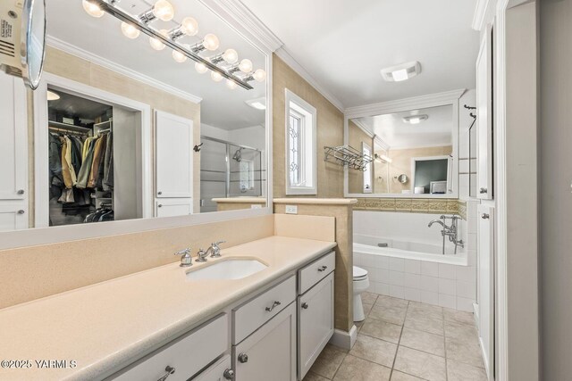 bathroom with a stall shower, crown molding, tile patterned floors, vanity, and a spacious closet