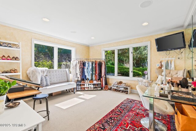 carpeted living room with crown molding and recessed lighting
