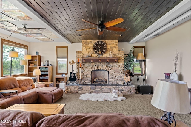 12900 Douglas Rd, Yakima, WA 98908 - living area with a ceiling fan, carpet floors, a fireplace, and wooden ceiling