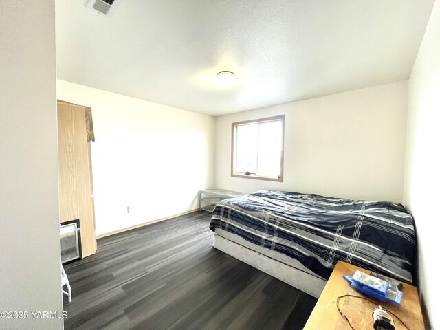 full bath featuring a walk in closet and a stall shower