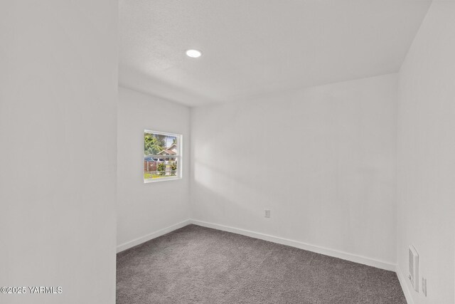 810 S 6th Ave, Yakima, WA 98902 - carpeted spare room with baseboards and recessed lighting
