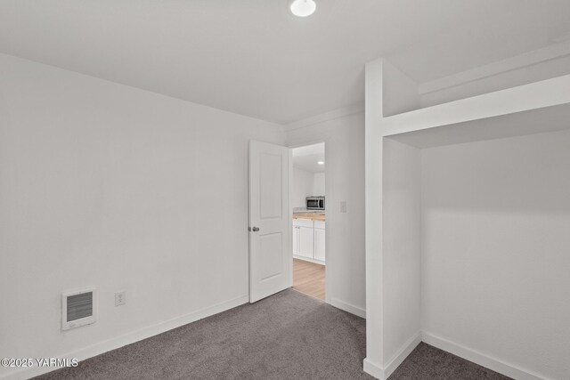 810 S 6th Ave, Yakima, WA 98902 - empty room with carpet and baseboards