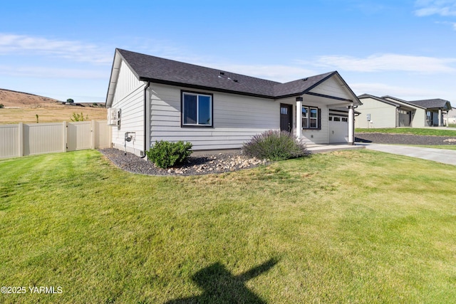 5301 Sage Way, Yakima, WA 98901 - ranch-style home with an attached garage, driveway, and roof with shingles