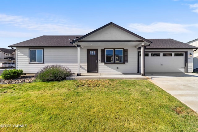 5301 Sage Way, Yakima, WA 98901 - single story home featuring an attached garage, a front yard, driveway, and a shingled roof