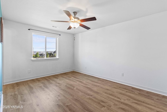 5301 Sage Way, Yakima, WA 98901 - empty room featuring wood finished floors and a ceiling fan