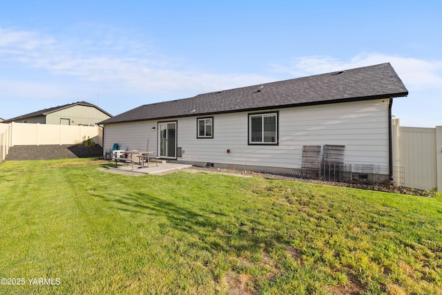 5301 Sage Way, Yakima, WA 98901 - back of property featuring a patio, a fenced backyard, and a shingled roof