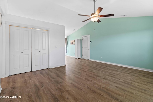 5301 Sage Way, Yakima, WA 98901 - unfurnished bedroom with wood finished floors, vaulted ceiling, a closet, and a ceiling fan