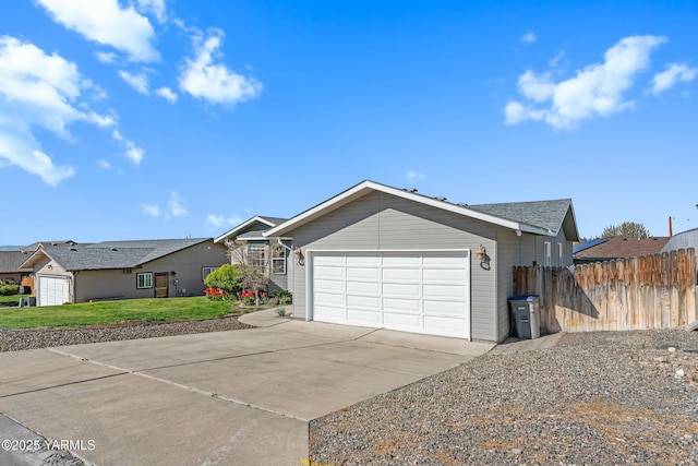 604 N 57th St, Yakima, WA 98901 - ranch-style home with a garage, driveway, a front yard, and fence