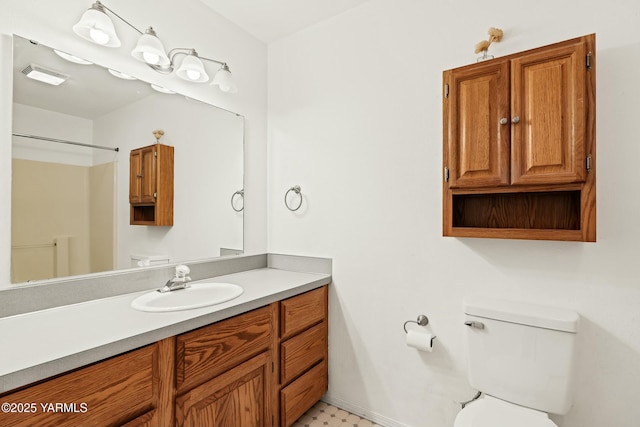 604 N 57th St, Yakima, WA 98901 - bathroom with visible vents, toilet, and vanity