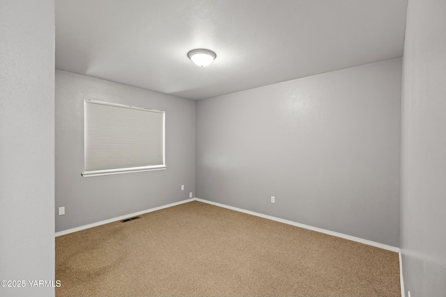 604 N 57th St, Yakima, WA 98901 - carpeted spare room with baseboards and visible vents