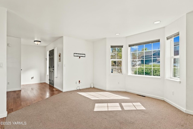 604 N 57th St, Yakima, WA 98901 - carpeted spare room with recessed lighting, wood finished floors, visible vents, and baseboards