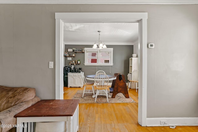 319 S 14th Ave, Yakima, WA 98902 - dining area featuring a chandelier and wood finished floors