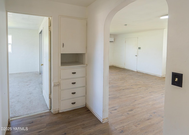 2002 Landon Ave, Union Gap, WA 98903 - hall featuring arched walkways, light wood-style floors, and baseboards