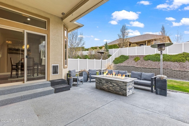 607 N 74th Ave, Yakima, WA 98908 - view of patio / terrace with a fenced backyard and an outdoor living space with a fire pit