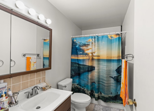 7610 Summitview Ave # 1, Yakima, WA 98908 - bathroom featuring tasteful backsplash, toilet, vanity, and tile patterned flooring