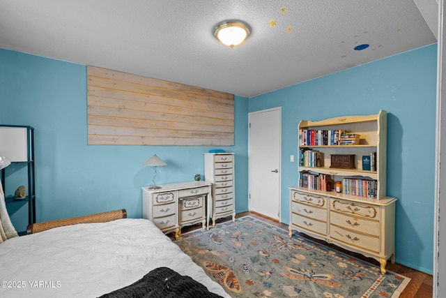 7610 Summitview Ave # 1, Yakima, WA 98908 - bedroom featuring a textured ceiling and wood finished floors