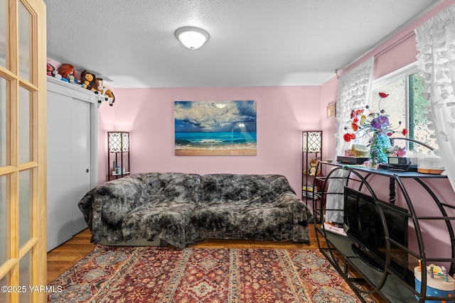 7610 Summitview Ave # 1, Yakima, WA 98908 - living area with a textured ceiling and wood finished floors